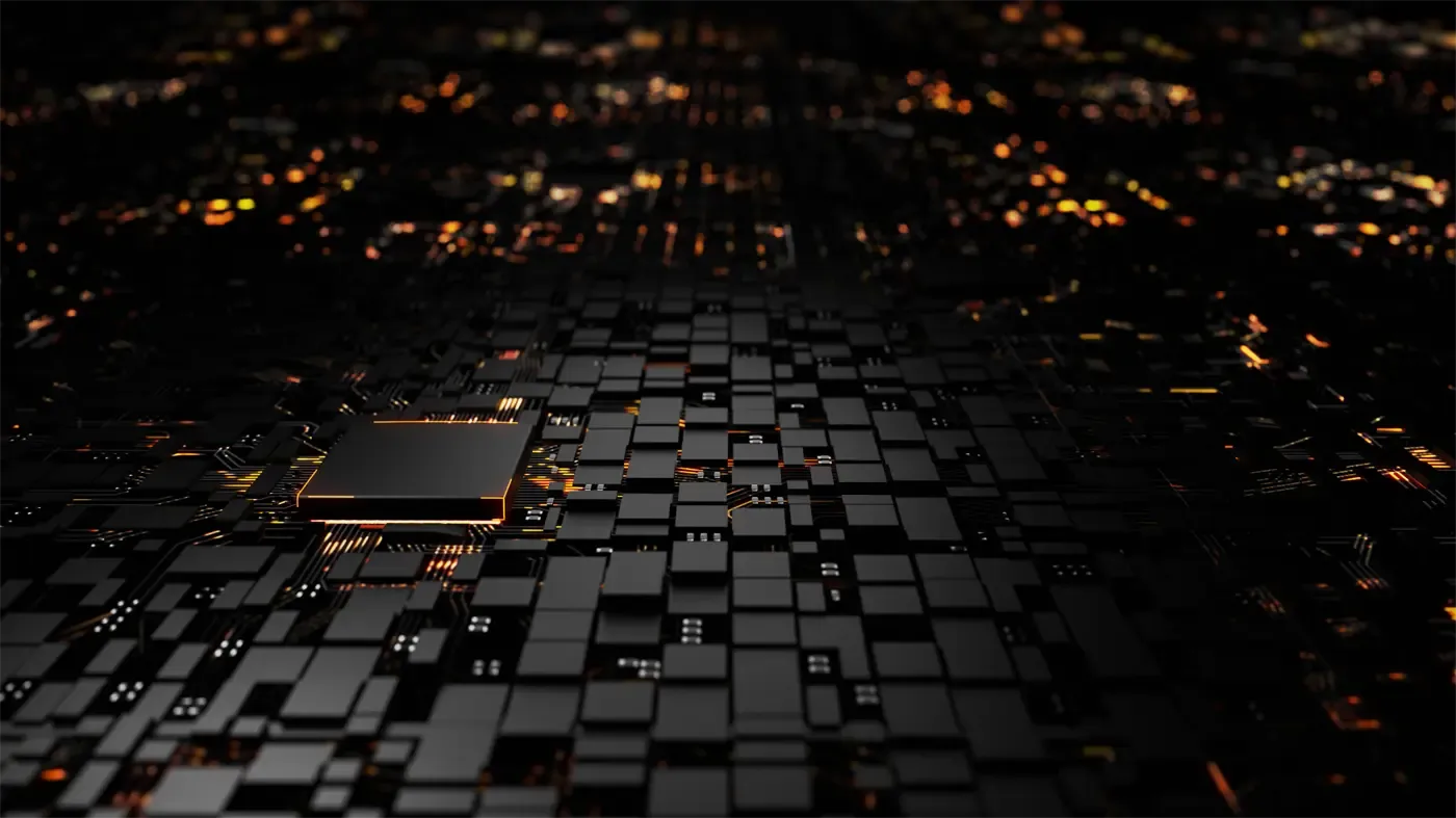 Dark circuit board glowing with orange light.