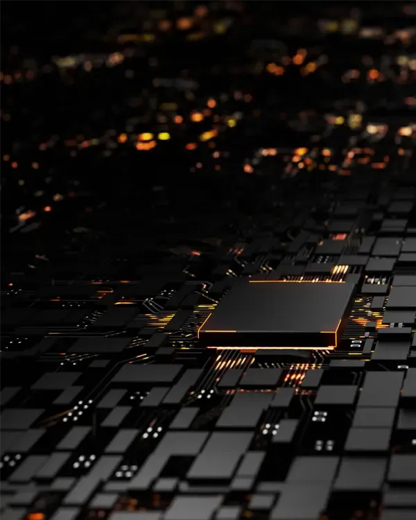 Dark circuit board glowing with orange light.